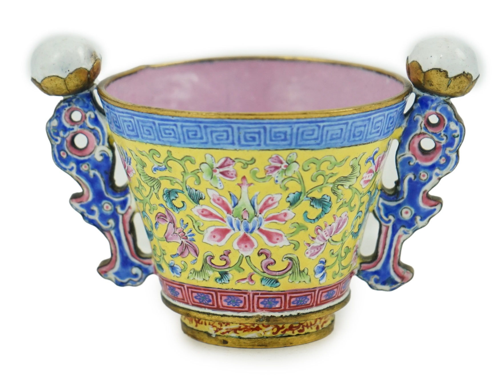 A Chinese Guangzhou enamel two handled wine cup, four character Qianlong mark and of the period (1736-1795)